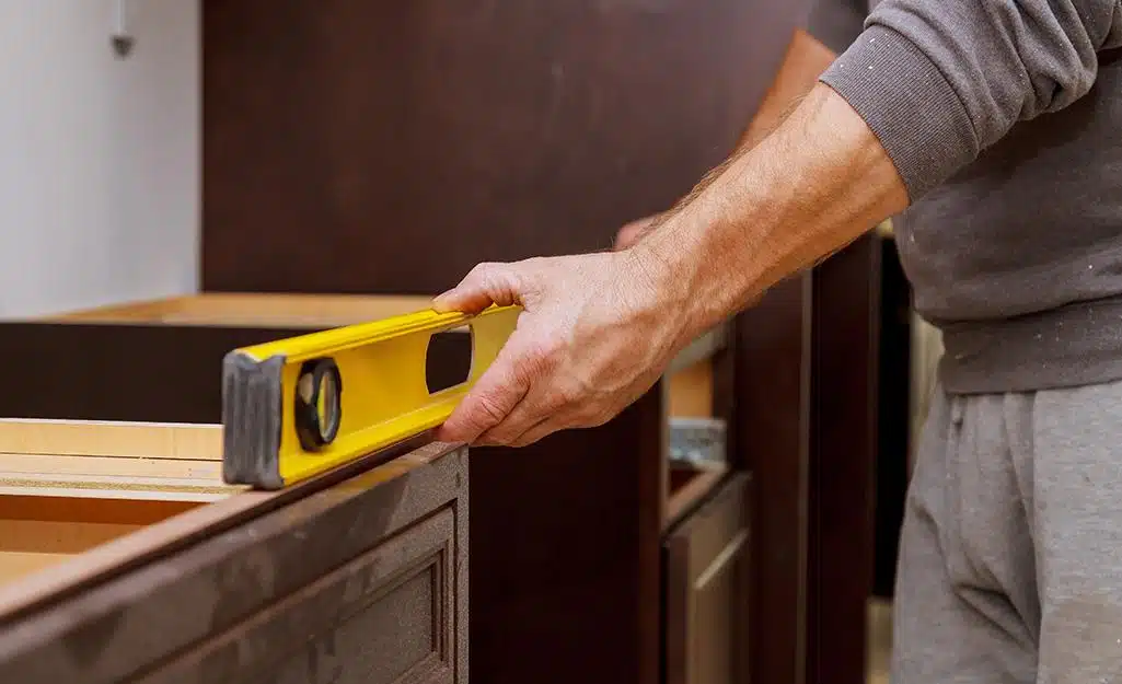 http://noahhand.com/wp-content/uploads/2022/06/how-to-install-base-cabinets-step-4.jpeg